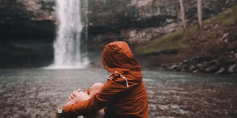 Sitting by a Waterfall in the Rain